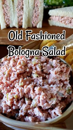 old fashioned bologna salad in a bowl on a plate with breadsticks next to it