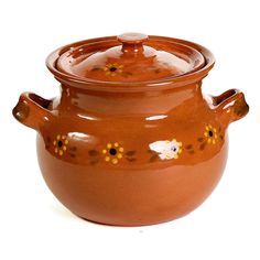 a brown pot with yellow flowers on the rim and lid is sitting in front of a white background