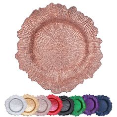 a pink plate with six different colored plates in front of it and the same color