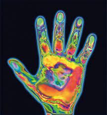 an image of a colorful hand on a black background