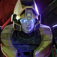 a close up of a robot from the video game overwatching with glowing eyes