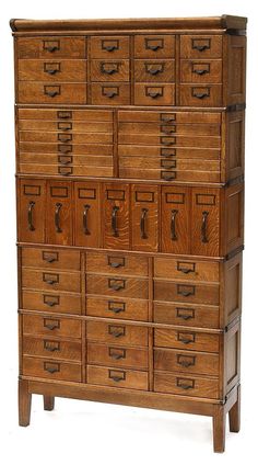 an old wooden dresser with many drawers