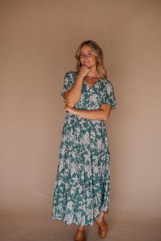 Introducing the Caralenia Button-Down Dress in Turquoise - a playful addition to your wardrobe! Featuring a relaxed fit and nursing-friendly functionality, this dress also boasts a convenient side zipper and a tiered skirt for added flair. Perfect for any occasion! Bridesmaid Tops, Blessing Dress, Temple Dress, Timeless Dress, Boho Style Dresses, Nursing Friendly, Effortless Elegance, Button Down Dress, Tiered Skirt