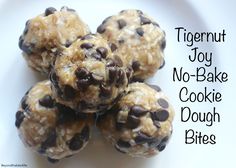 chocolate chip cookie dough bites on a white plate with the words, tigernut joy no - bake cookie dough bites