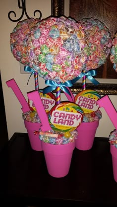 candy filled buckets with candies in them