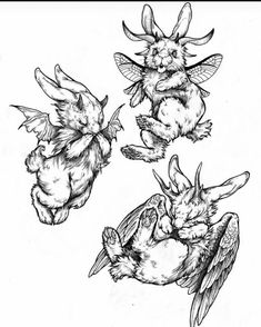 three rabbits with wings on their backs, one flying and the other holding an object in its