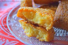 two pieces of cake sitting on top of a glass plate