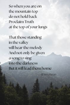 a poem written in black on top of a mountain with trees and mountains behind it