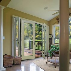 the inside of a house with french doors