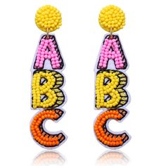 PRICES MAY VARY. Being a teacher is not just a career,but a passion,and intentional investment into the next generation.We all know that these special people deserve the world,for helping our children grow into the best possible versions of themselves.these super cute ABC dangling earrings features felt back covered with rainbow seed beads details to create a statement pieces.bring a little joy and cheer to brighten up your teacher days! Amp up your teacher style with the adorable teacher earrin Earrings Preppy, School Earrings, Teacher Accessories, Teacher Earrings, Back To School Gifts For Teachers, Earrings Dangle Simple, Being A Teacher, School Jewelry, Estilo Preppy