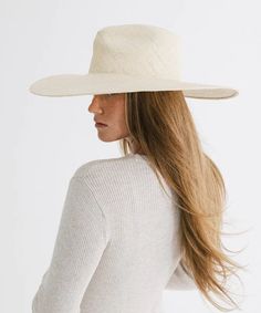 Indulge in effortless sophistication with this fedora style featuring a wide relaxed brim. The intricately hand-woven Panama straw exudes a luxe look + feel that is sure to keep you stylishly shaded from the summer heat while staying light + breezy. Size: 57 (S/M) Elegant Fedora With Upf 50+ And Curved Brim, Elegant Fedora For Kentucky Derby Upf 50+, Elegant Short Brim Boater Hat With Upf 50+, Elegant Boater Hat With Upf 50+ And Short Brim, Chic Boater Hat With Upf 50+ And Flat Brim, Classic Wide Brim Hat For Vacation, Elegant Wide Brim Toquilla Straw Fedora, Elegant Wide Brim Fedora For Everyday, Elegant Hats With Short Brim Unlined