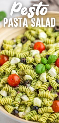 A close up view of a bowl of pesto pasta salad. Mozzarella And Tomato, Gluten Free Italian, Spiral Pasta, Picnic Recipes, Summer Side Dish, Pesto Pasta Salad, Basil Recipes, American Summer, Rotini Pasta