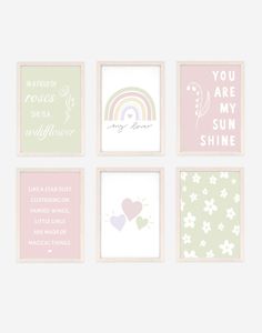 four framed prints with different sayings in pastel pink, mint green and white