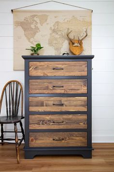 a wooden dresser sitting on top of a hard wood floor