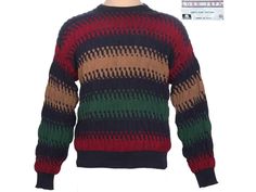 A 1990s vintage pullover sweater by Lord Jeff with strong Coogi vibes. Thick, soft fine cotton with a textured weave in navy blue, red, tan, and green. Made in USA.  Excellent condition, no stains, holes, or pilling. The color is even with no fading.  The size on the tag is Men's XL. To ensure a perfect fit, it's best to measure yourself or a garment you already own and compare to the measurements below:  Chest: 46" Waistband: 32", stretches to 48" Shoulder seam to seam: 25 1/2" Length: 25" Sleeve length: 23" from sleeve seam to cuff We ship to most countries and we can combine shipping for most items. Please contact us for a shipping quote.  Please see our other items for more suits and sport coats, vintage clothing, vintage home decor, and more! Vintage Pullover, Mens Pullover, Vintage Pullovers, Pullover Men, 90s Vintage, Sport Coat, Pullover Sweater, Pullover Sweaters, Sweater Outfits