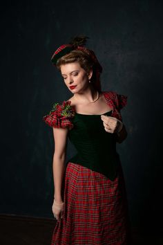 Scottish esthetics inspired Victorian period dress. Suitable as an evening gown or a ball gown for 1880s events, will look great for natural form or bustle era dresscode. The dress consists of the velvet bodice, decorated with tartan fabric and artificial plants, and the skirt with plaid fabric band, which represents an element of Scottish national costume. The plaid fabric is to be chosen, please PM for the options, as the one shown may be not available in the moment. Please note that the headp Tartan Ball Gown, Red Vintage Victorian Dress With Fitted Bodice, Tartan Gown, Christmas Ballgown, Gothic Ballgown, 1890s Dress, Victorian Ball, Victorian Fashion Dresses, Victorian Gown