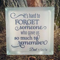 a glass sign that says it's hard to forget someone who gave us so much to remember