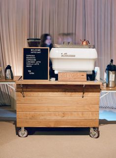 an old fashioned coffee machine is on display