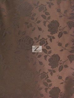 a brown and black flowered fabric with the letter z on it's side