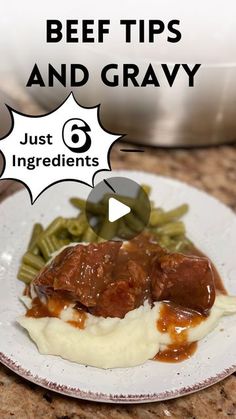 beef tips and gravy on a plate with green beans