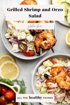 grilled shrimp and orzo salad in bowls with lemons, cucumbers, tomatoes, onions, radishes on the side