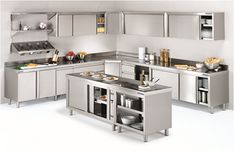 a kitchen with stainless steel appliances and cabinets