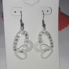 Nwt Brand Fashion Earrings Color White Double Heart Earrings Nickel Free White Heart Earrings, White Dangle Earrings For Valentine's Day, White Heart Earrings With Ear Wire As A Gift, White Hypoallergenic Heart Earrings For Anniversary, Elegant White Hypoallergenic Heart Earrings, Hypoallergenic White Heart Earrings For Anniversary, White Earrings With Heart Charm As Gift, White Dangle Heart Earrings For Valentine's Day, White Pierced Earrings For Valentine's Day