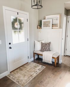 the entryway is clean and ready for us to use as a sitting area in the house