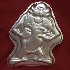 a cookie pan shaped like an old cartoon character