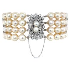 Find vintage glory in this outstanding mid-century jeweled Art-Deco style pearl bracelet. Exquisite, featuring a sparkling diamond covered white gold ornamental clasp which brilliantly hosts four strands of lustrous matching hand-knotted AAA creamy white round 8 mm+ Akoya pearls creating this beautiful formal wear jeweled accessory that is perfect for bridal and special occasions. Its spectacular diamond covered oblong-shape white gold clasp measures a generous 1 inch by 1/2 inch and is graced w Gold Filigree Bracelet, Vintage Beaded Bracelet, Gold Bow Tie, Pearl Bracelet Gold, Pearl Necklace Vintage, Pearl Bracelets, Multi Strand Bracelet, Sparkling Diamond, Estilo Art Deco