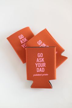 three red coasters that say go ask your dad