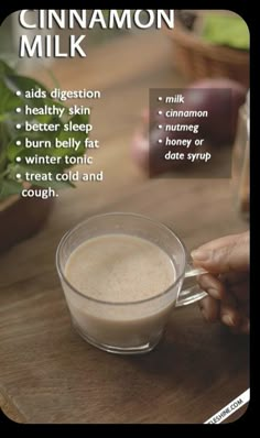 a person is holding a glass cup with cinnamon milk in it and there are instructions on how to make the drink