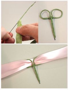 there is a pair of scissors that are being used to make something green and pink