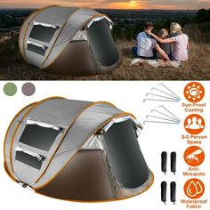 an inflatable tent with two people sitting on it and the sun setting behind it