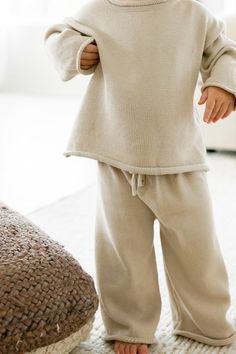 Get your little one ready for the cooler seasons with our Quincy Sweater Set in Cream. This stylish knit set features a rolled hem for added detail and a loose, comfy fit for all-day wear. Perfect for fall and winter, this set is designed for both babies and toddlers, making it a must-have for their fall style. Stay cozy and stylish with our perfect pairing of pants and sweater.
Material: 100% Cotton Comfy And Cute Outfits, Fashion Campaign, Baby And Toddler, Sweater Material, Rolled Hem, Fall Style, Sweater Set, Knit Set, Stay Cozy