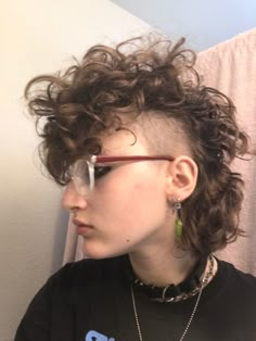 Short Punk Hairstyles For Curly Hair, Curly Shaved Sides Mullet, Short Curly Mullet Shaved Sides, Mullet With Shaved Sides Curly Hair, Mohawk Down, Curly Alt Mullet, Short Curly Punk Hair, Permed Mohawk