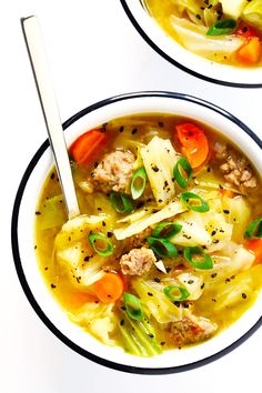 two bowls of soup with meat and vegetables