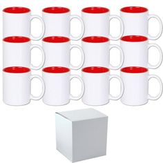 twelve white and red coffee mugs in front of a box