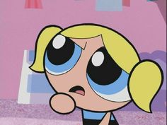 the powerpuff girls cartoon character with blue eyes and blonde hair is looking at something