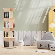 there are stuffed animals sitting on the floor in this children's room with bookshelves