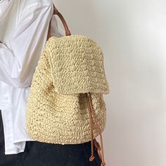 In Stock Fast Shipping from Los Angeles! The Elena Handbags Straw Backpack with Leather Strap is a perfect combination of style and sophistication. The straw body is both delicate and durable, while the leather strap lend a touch of luxury to this classic design. Perfect for the modern fashionista, this backpack is ideal for a luxurious take on everyday style. Inside pocketDrawstring closureAdjustable strap around 30.7 inchesSize approximately: 15"W X 16"H X 1"D Designer Style ID: 8589 Casual Beige Backpack For Spring, Beige Straw Backpack For Travel, Trendy Summer Shoulder Bag Backpack, Trendy Summer Standard Backpack, Brown Straw Backpack Bag For Travel, Large Capacity Summer Backpack Shoulder Bag, Brown Straw Backpack For Travel, Summer Large Capacity Shoulder Backpack, Spring Beige Backpack For Daily Use