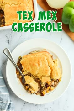 a close up of a pie on a plate with the words tex mex casserole