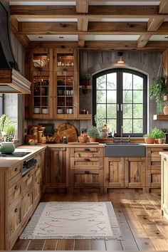 a kitchen filled with lots of wooden cabinets and counter top space next to a window