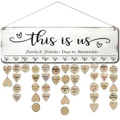 this is us family & friends days to remember hanging sign with hearts and words on it