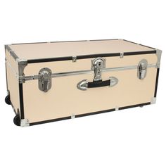 an old fashion trunk is shown with chrome handles and black trimmings on the sides