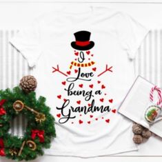 I Love Being A Grandma/Nana Snowman Shirt Or Sweatshirt. I Can Make On Different Color Shirt, Long Sleeve, And Sweatshirts. Please Dm With Any Questions. :) #Snowman #Grandma #Nana #Christmas Nana Christmas, Being A Grandma, Snowman Shirt, Grandma Christmas, Blue Names, Tan T Shirt, Grandmas Christmas, Blue White Top, Yellow Tees