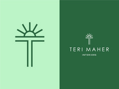 the logo for teri maher interiors