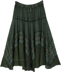 A forest green skirt in soft and flowy rayon fabric, embellished with a net-like fine embroidery in the lower half and is highlighted with three wavy bands of stonewashed floral fabric in green, red and blue with overlaying floral embroidery. The long skirt is comfortable and flexible with its elastic waist with a drawstring allowing for size adjustments. #tlb #Embroidered #Misses #MaxiSkirt #bohemianfashion #RenaissanceSkirt #Rayonlongskirt #costumeskirt #fairycoreskirt Green Flowy Bohemian Maxi Skirt, Bohemian Flowy Green Bottoms, Green Flowy Bohemian Skirt, Green Bohemian Flowy Skirt, Green Flowy Bohemian Bottoms, Flowy Green Bohemian Bottoms, Green Bohemian Dress With Long Skirt, Green Bohemian Long Skirt, Green Bohemian Long Dress