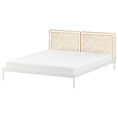 the bed frame is made from metal and has two headboards, one with a white mattress