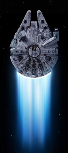 a star wars movie poster with a spaceship in the background